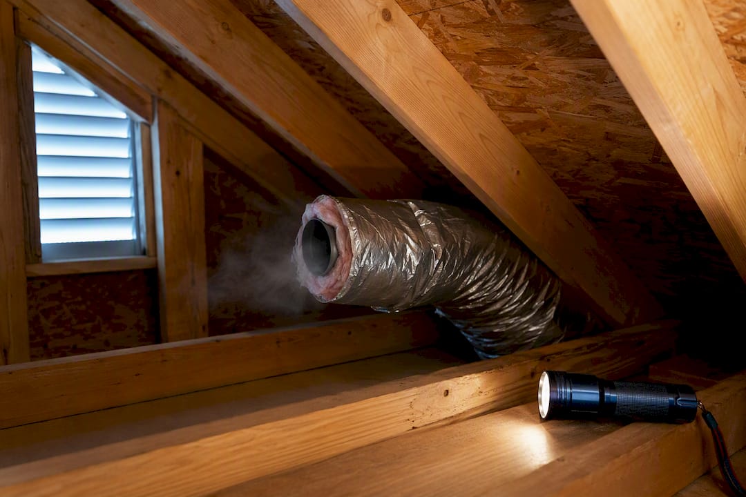 Bathroom exhaust duct ending inside attic